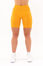 V3 Apparel Women's seamless Limitless high waisted cycle shorts in orange – Squat proof 5 inch inseam leg bum enhancing shorts for Gym workouts training, Running, yoga, bodybuilding and bikini fitness.